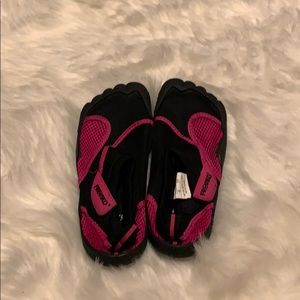Pink and black water shoes